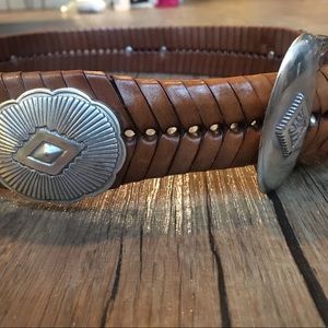 Brown belt with metal decoration